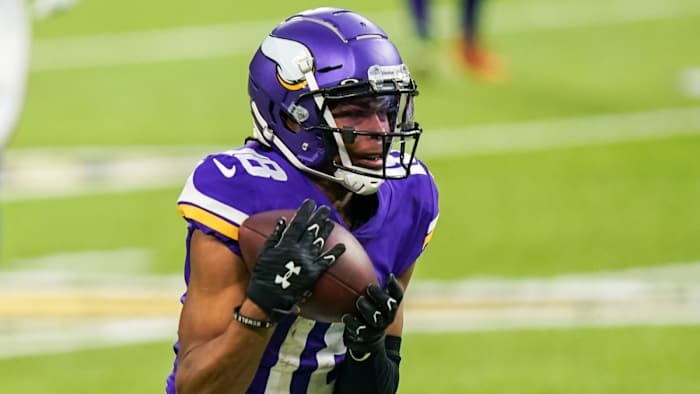 Jefferson carries the ball during the fourth quarter against the Jacksonville Jaguars.